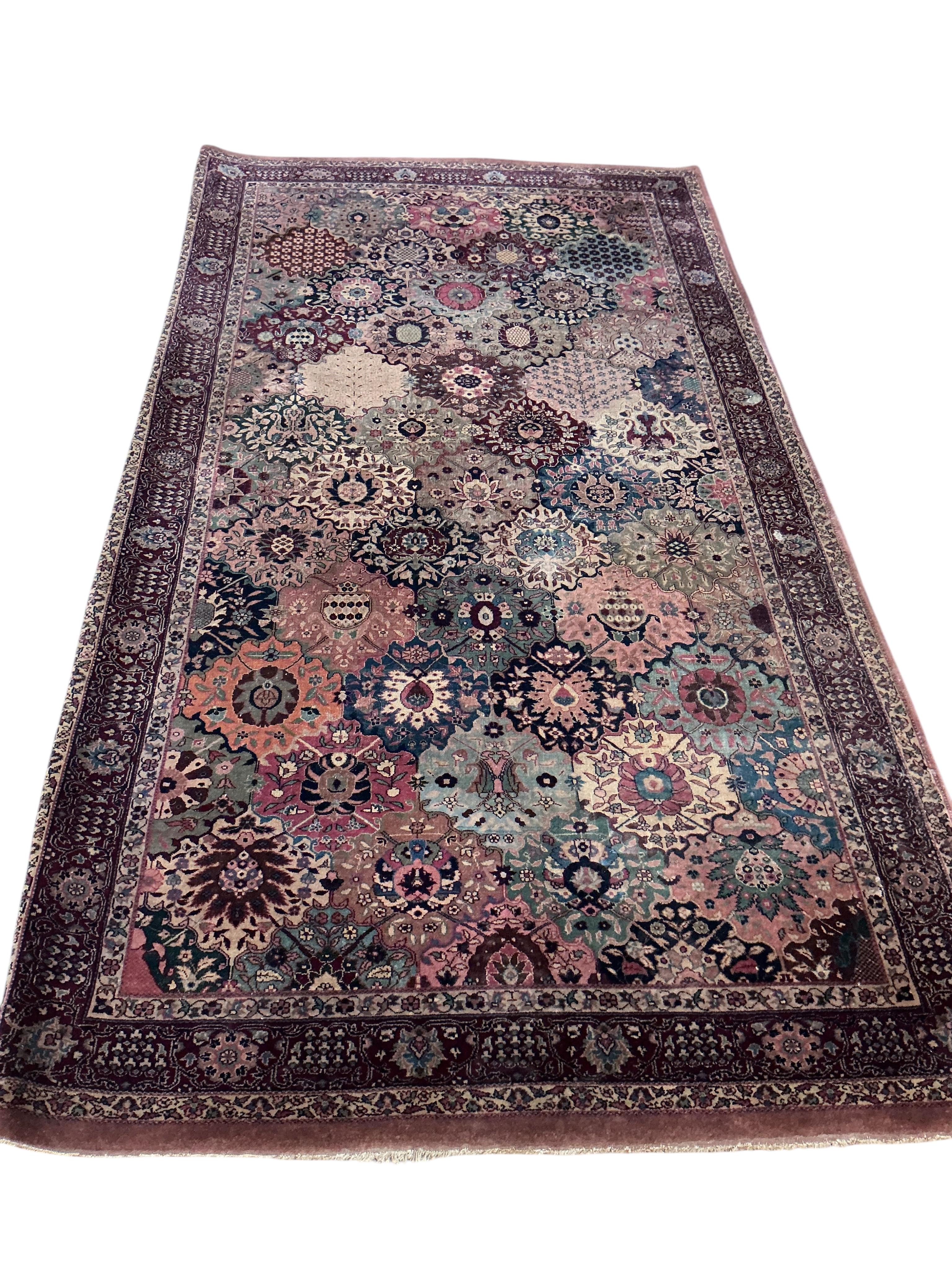 A North West Persian floral rug, 250 x 136cm